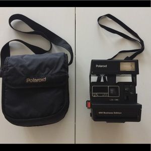 Vintage Polaroid Instant Camera 600 Business Edit